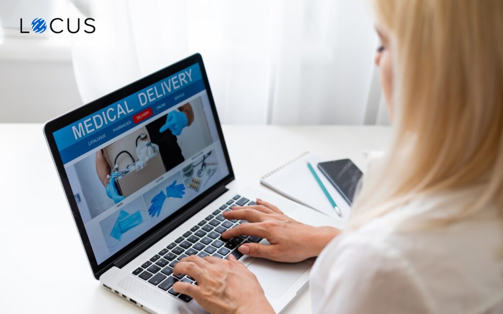 Pharmacist checking the delivery tracking on her laptop