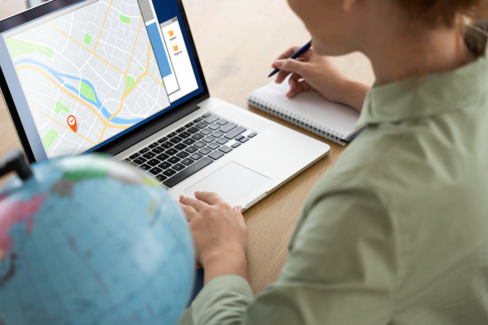 Travel agent planning trip using app and routes for clients
