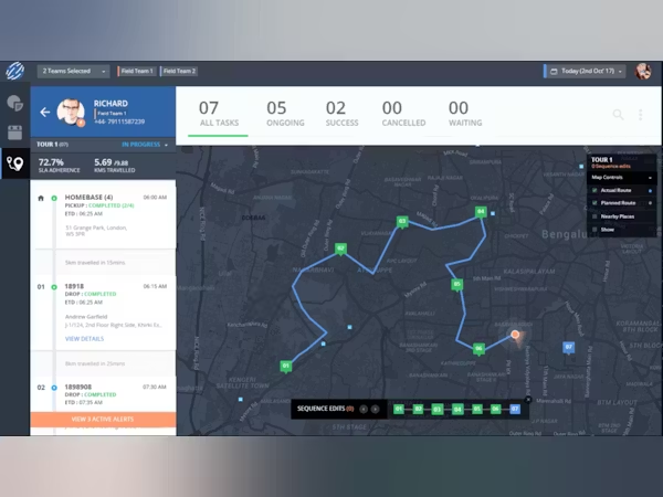 Logistics manager comparing carrier performance charts and shipping rates on a laptop screen