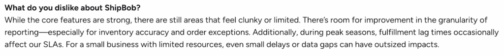 Review screenshot showing limited reporting features for ShipBob users.